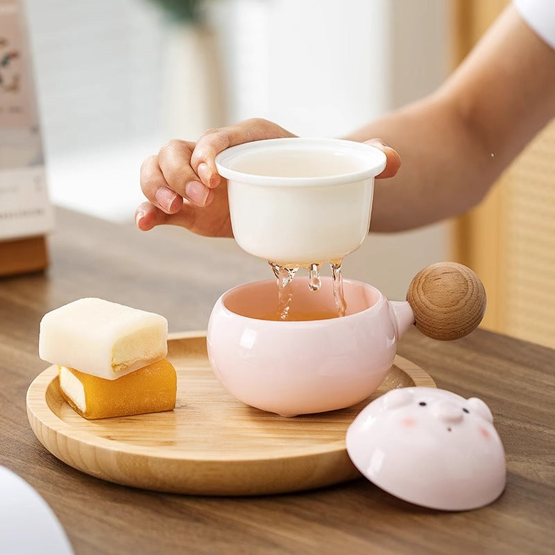 Cute Pig Tea Infuser Cup Side View - Showcasing the unique shape of this cartoon pig cup, designed for brewing loose-leaf tea and infusing coffee blends effortlessly.