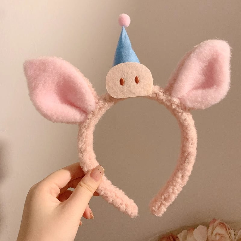 Adorable cartoon pig plush headband designed for face washing