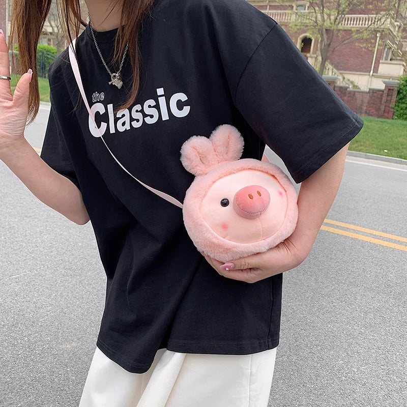 Close-up of soft material on the Cartoon Pig Plush Bag, designed for comfort and style.