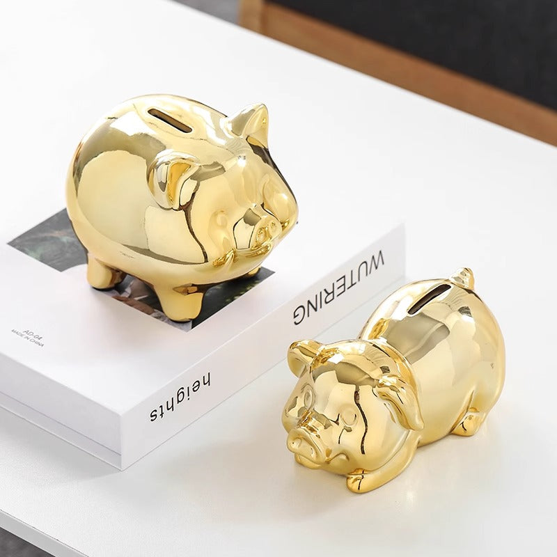 Adorable ceramic gold piggy bank design for savings and decor