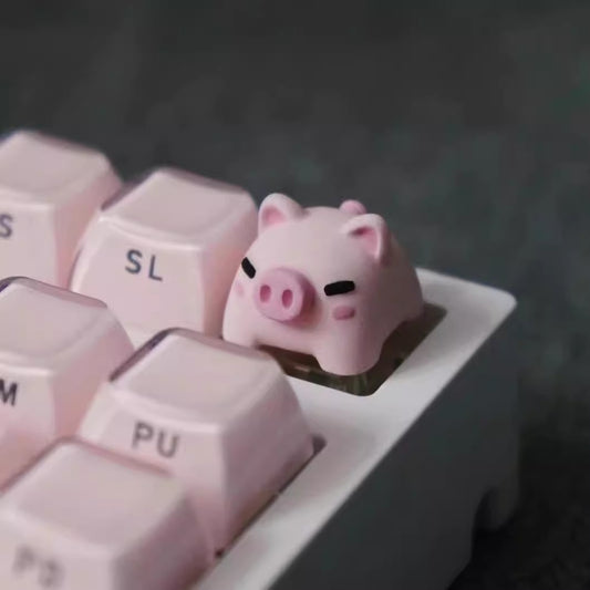  Colorful cartoon pig keycap, a fun accessory for gaming keyboards and personalization.