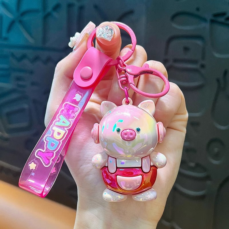 Cute electroplated pig keychain with adorable design, perfect for animal lovers.