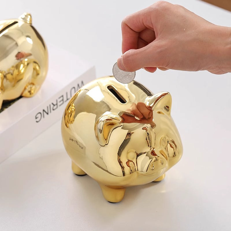 Cute gold pig piggy bank encouraging fun saving habits