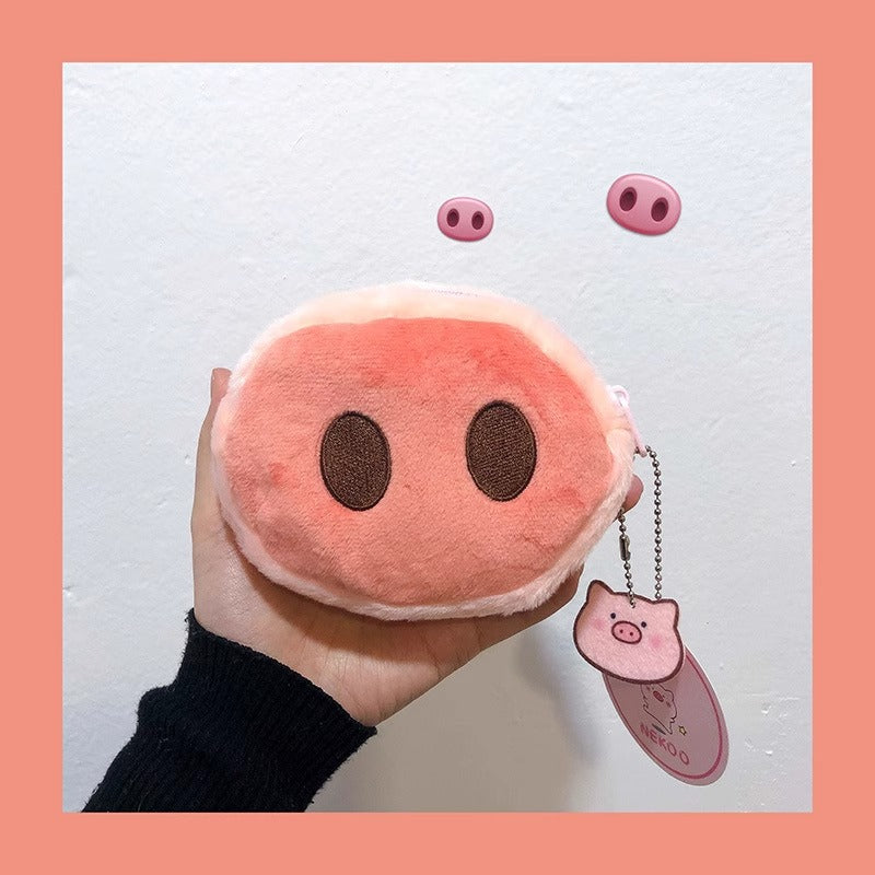 Adorable pig nose shaped wallet – soft plush coin purse for everyday use.