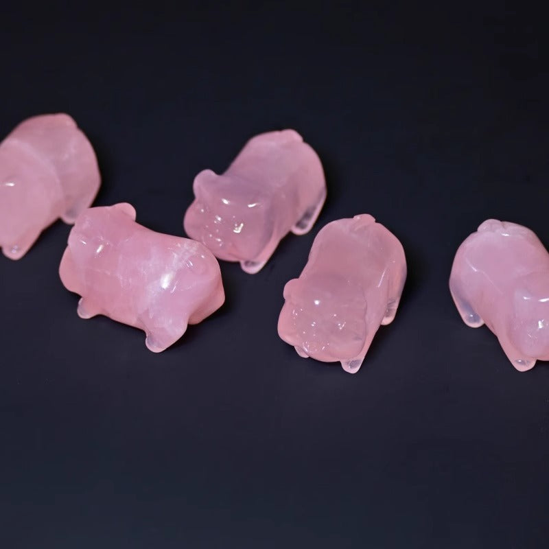 Natural Pink Crystal Pig Figurine symbolizing luck and prosperity.

