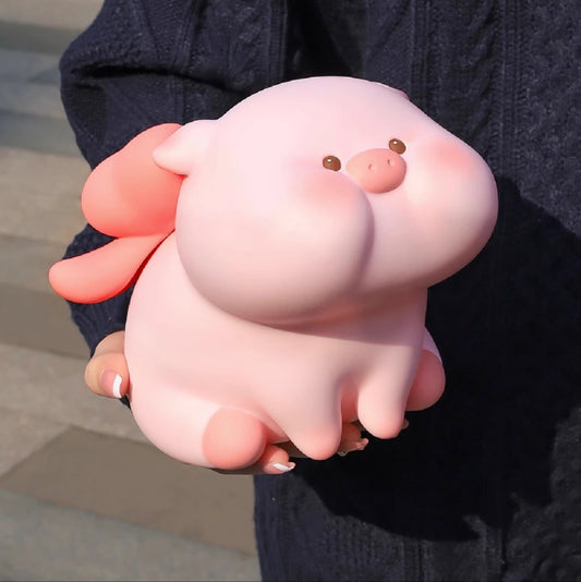 Adorable cute pink piggy bank with a charming design for kids' savings.