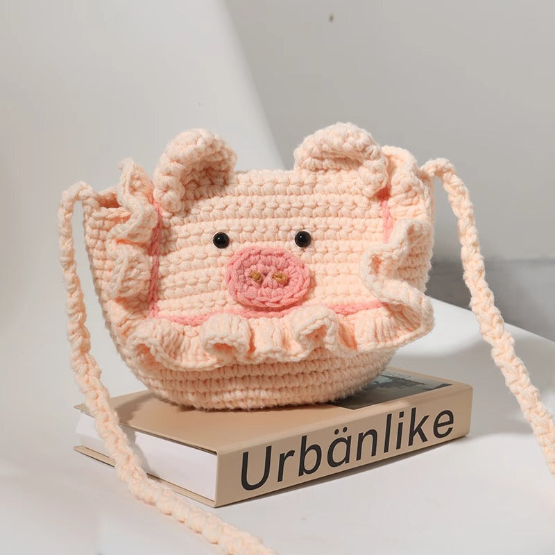 Fun and whimsical handwoven pig bag, crafted from lightweight coral fleece for daily use.