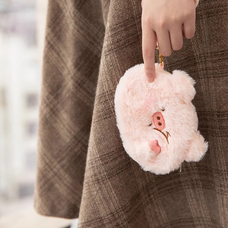 Fun and functional plush pig wallet – ideal for everyday use and organizing small items.