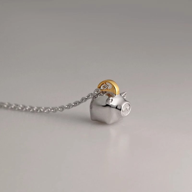 Wealth attracting pig necklace symbolizing good luck and happiness